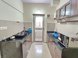 Kitchen in 2 BHK Apartment at Casa Rio Nyasia, Dombivli East – for Rent