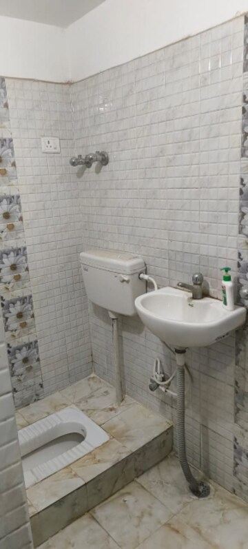 Bathroom in 3 BHK Apartment at Kidwaipuri – for Sale