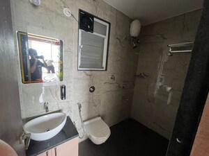 Bathroom in 3 BHK Apartment at Unique K Ville, Ravet – for Rent