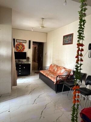 Living Room in 2 BHK Apartment at Vas Pushp Vinod 2, Borivali West – for Sale