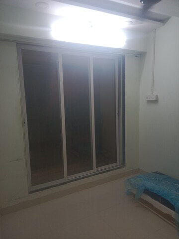 Living Room in 1 BHK Apartment at Shree Shivdarshan SRA CHS, Bhandup West – for Rent