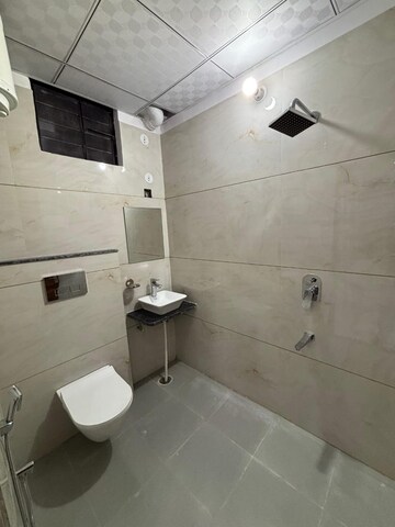 Bathroom in 3 BHK Apartment at Mansarovar Extension – for Rent