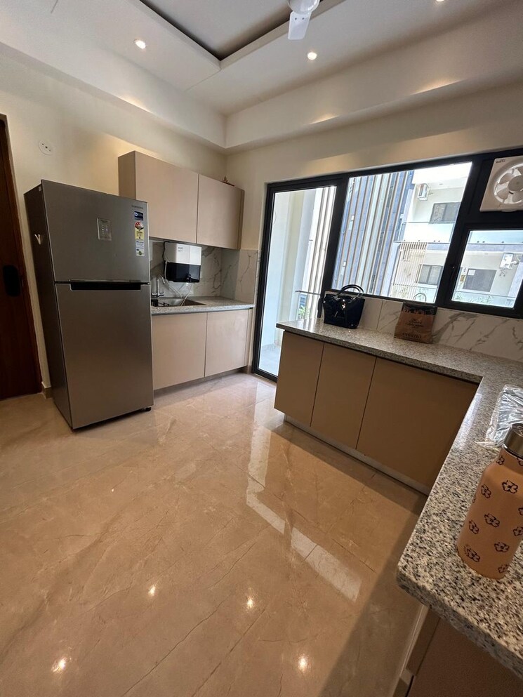 Kitchen, suncity-vatsal-valley 2 Bedroom 1050 Sq.Ft. Builder Floor In Gwal Pahari Gurgaon 9300218