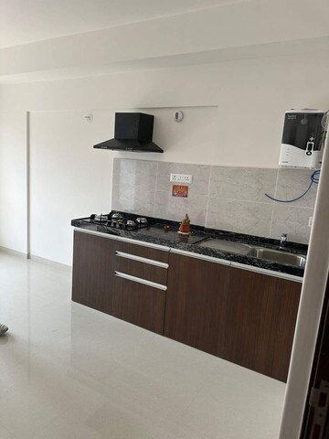 Kitchen in Studio Apartment at Gera World of Joy, Kharadi – for Rent