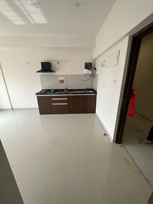 Kitchen in Studio Apartment at Gera World of Joy, Kharadi – for Rent