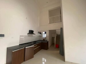 Kitchen in 2 BHK Apartment at Gera World of Joy, Kharadi – for Rent