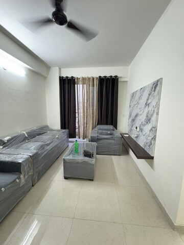 Living Room in 2 BHK Apartment at Signature The Millennia 2, Sector 37d – for Rent