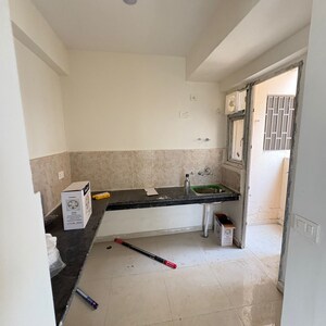 Kitchen in 2 BHK Apartment at Signature The Millennia 2, Garoli Kalan – for Rent