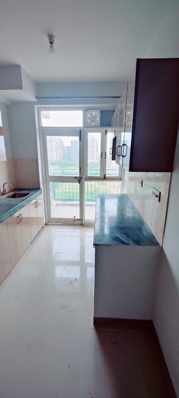 Kitchen in 1 BHK Apartment at Adani Aangan, Sector 89a – for Sale