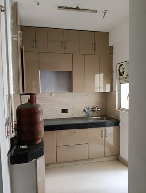 Kitchen in 2 BHK Apartment at VVIP Addresses, Raj Nagar Extension – for Sale