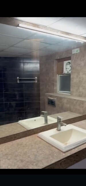 Bathroom in 3 BHK Apartment at Raheja Vedaanta, Sector 108 – for Rent