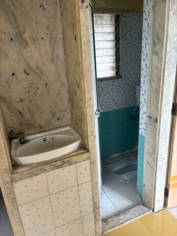 Bathroom in 1 BHK Apartment at Rashmi Star City, Naigaon East – for Sale