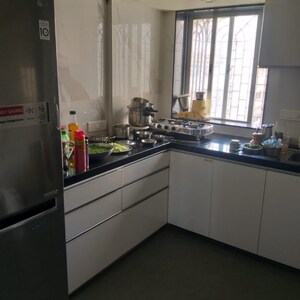 Kitchen in 2 BHK Apartment at Greenfields CHS, Lokhandwala Complex – for Rent