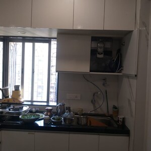 Kitchen in 2 BHK Apartment at Greenfields CHS, Lokhandwala Complex – for Rent