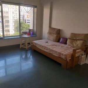 Living Room in 2 BHK Apartment at Greenfields CHS, Lokhandwala Complex – for Rent