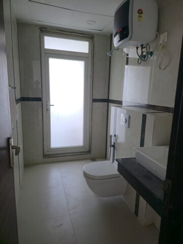 Bathroom in 4 BHK Apartment at Krrish Provence Estate, Gurgaon Faridabad Road – for Rent