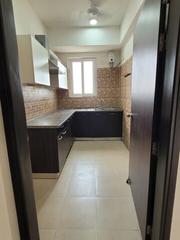 Kitchen in 2 BHK Apartment at Umang Winter Hills, Sector 77 – for Rent