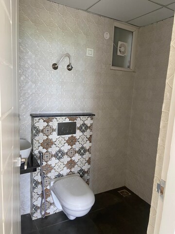 Bathroom in 3 BHK Apartment at Maxxus Elanza, International Airport Road – for Rent