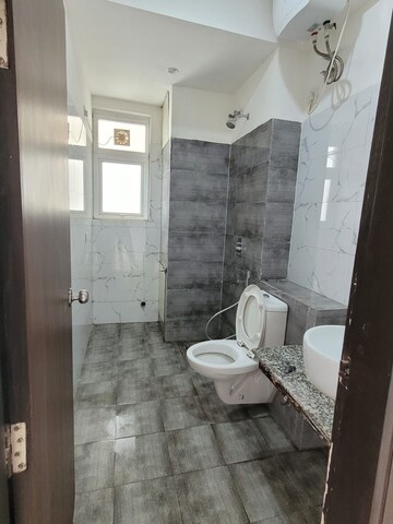 Bathroom in 2 BHK Apartment at Umang Winter Hills, Sector 77 – for Rent