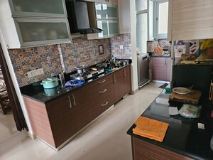 Kitchen in 3 BHK Apartment at Dhoot Time Residency, Sector 63 – for Rent