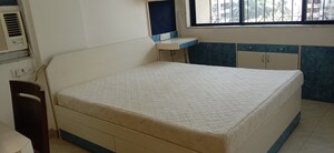 Bedroom in 2 BHK Apartment at Satellite Garden, Goregaon East – for Rent
