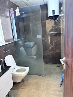 Bathroom in 3 BHK Apartment at Maya Green Lotus Saksham, International Airport Road – for Rent