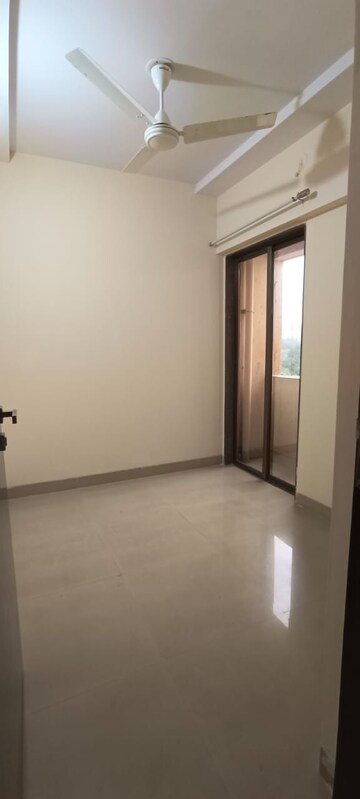 Room in 2.5 BHK Apartment at Madhav Shreeji Palacia, Waghbil – for Sale