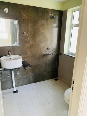 Bathroom in 3 BHK Apartment at International Airport Road – for Rent