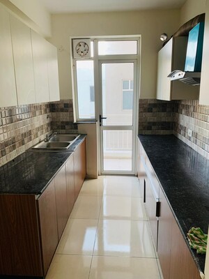 Kitchen in 3 BHK Apartment at International Airport Road – for Rent