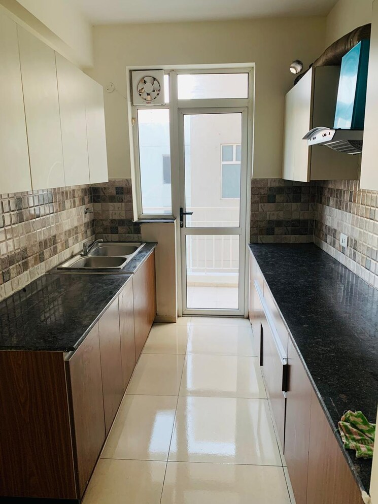 Kitchen, international airport road 3 Bedroom 1345 Sq.Ft. Apartment In International Airport Road Zirakpur 9300781