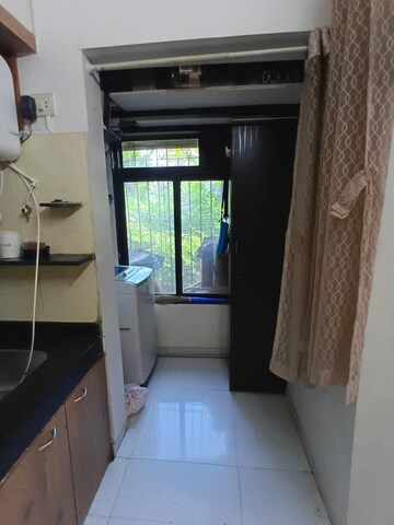 Kitchen in 1 BHK Apartment at Abrol Krishna Utsav, Malad West – for Rent