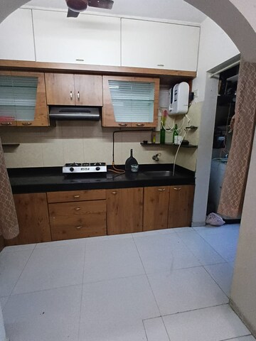 Kitchen in 1 BHK Apartment at Abrol Krishna Utsav, Malad West – for Rent