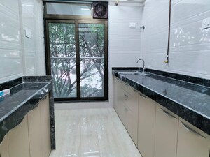 Kitchen in 1 BHK Apartment at Je And Vee Om Trimurti, Malad East – for Rent