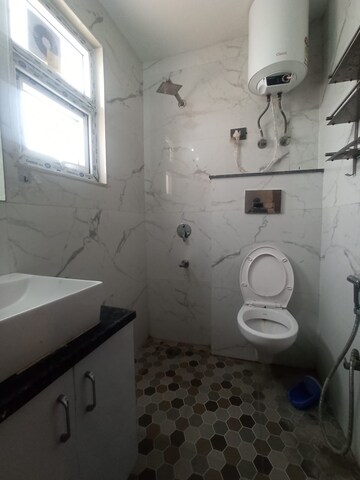 Bathroom in 1 BHK Apartment at Freedom Fighters Enclave – for Rent
