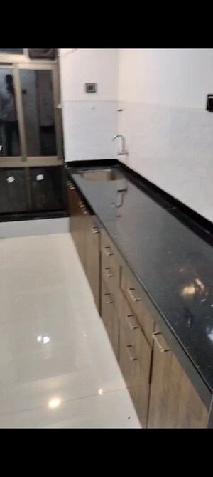 Kitchen in 2 BHK Apartment at Shiv Shakti Tower 28, Malad East – for Rent