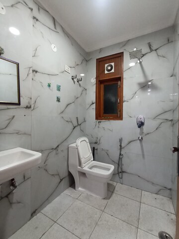 Bathroom in 2 BHK Builder Floor at Freedom Fighters Enclave – for Rent