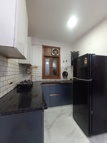 Kitchen in 2 BHK Builder Floor at Freedom Fighters Enclave – for Rent