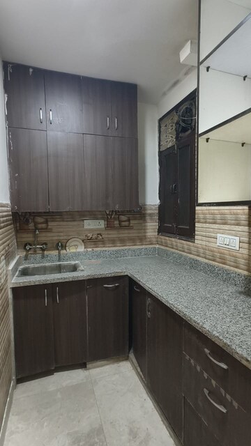 Kitchen in 1 RK Independent House at RWA Apartments Sector 52, Sector 52 – for Rent
