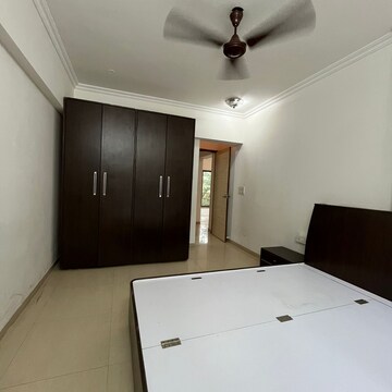 Bedroom in 3 BHK Apartment at Status CHS, Yari Road – for Rent