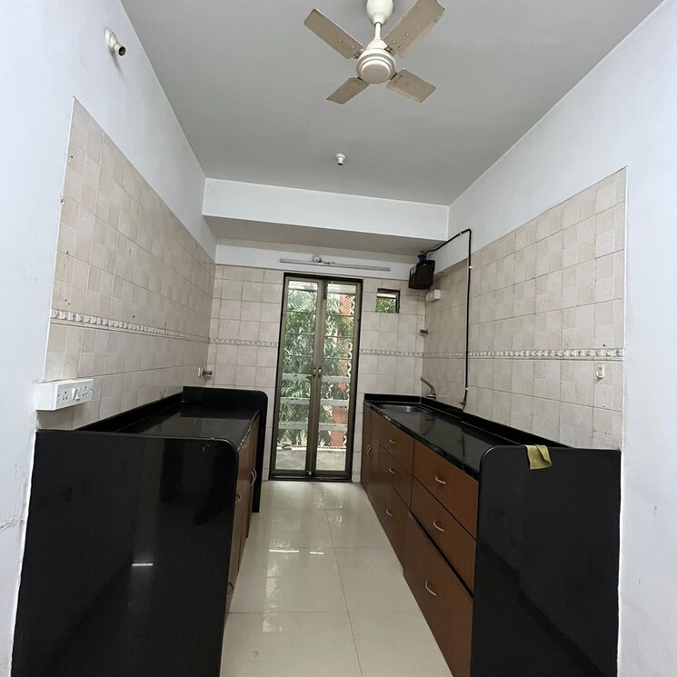 Kitchen, status-chs 3 Bedroom 1000 Sq.Ft. Apartment In Yari Road Mumbai 9300889
