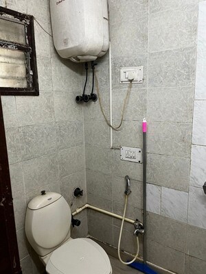 Bathroom in 2 BHK Apartment at Chanchal Kalyan Complex, Yari Road – for Rent