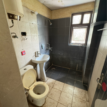 Bathroom in 2 BHK Apartment at Omaxe Happy Homes Bahadurgarh, Sainik Nagar – for Sale