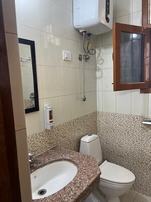 Bathroom in 2 BHK Apartment at NK Savitry Enclave, Vip Road – for Rent