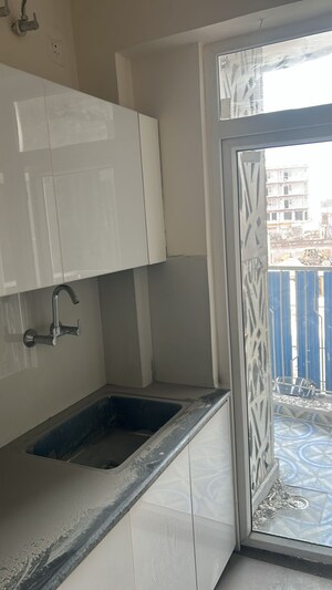 Kitchen in 2 BHK Apartment at Oxirich New Delhi Extension, Gagan Vihar – for Sale