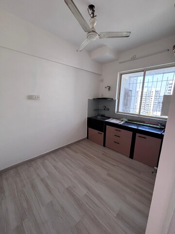 Room in 2 BHK Apartment at Grenville CHS, Andheri West – for Rent