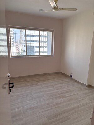 Room in 2 BHK Apartment at Grenville CHS, Andheri West – for Rent