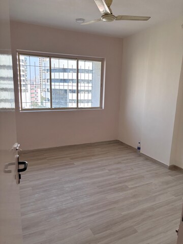 Room in 2 BHK Apartment at Grenville CHS, Andheri West – for Rent