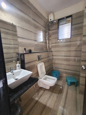 Bathroom in 1 BHK Apartment at Vijay Galaxy, Waghbil – for Rent