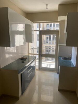 Kitchen in 1 BHK Apartment at Adani Aangan, Sector 89a – for Rent
