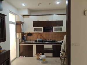 Kitchen in 3 BHK Apartment at Mahagun Mywoods, Sector 16c Greater Noida – for Rent